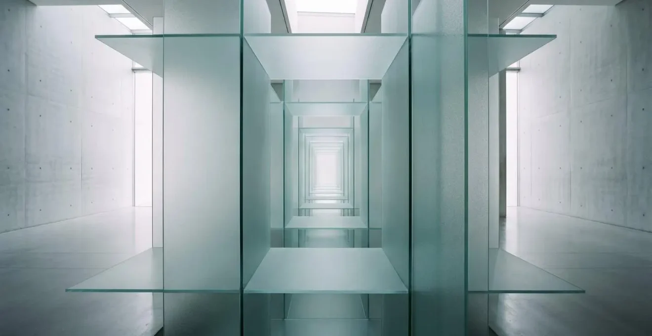 Environmental wide-angle photograph showing abstract architectural space with layered transparent structures representing AI decision transparency