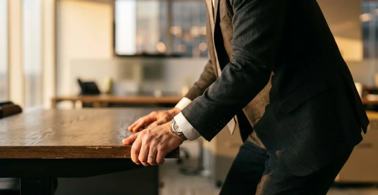Close-up of focused professional handling urgent business communication with emotional intensity